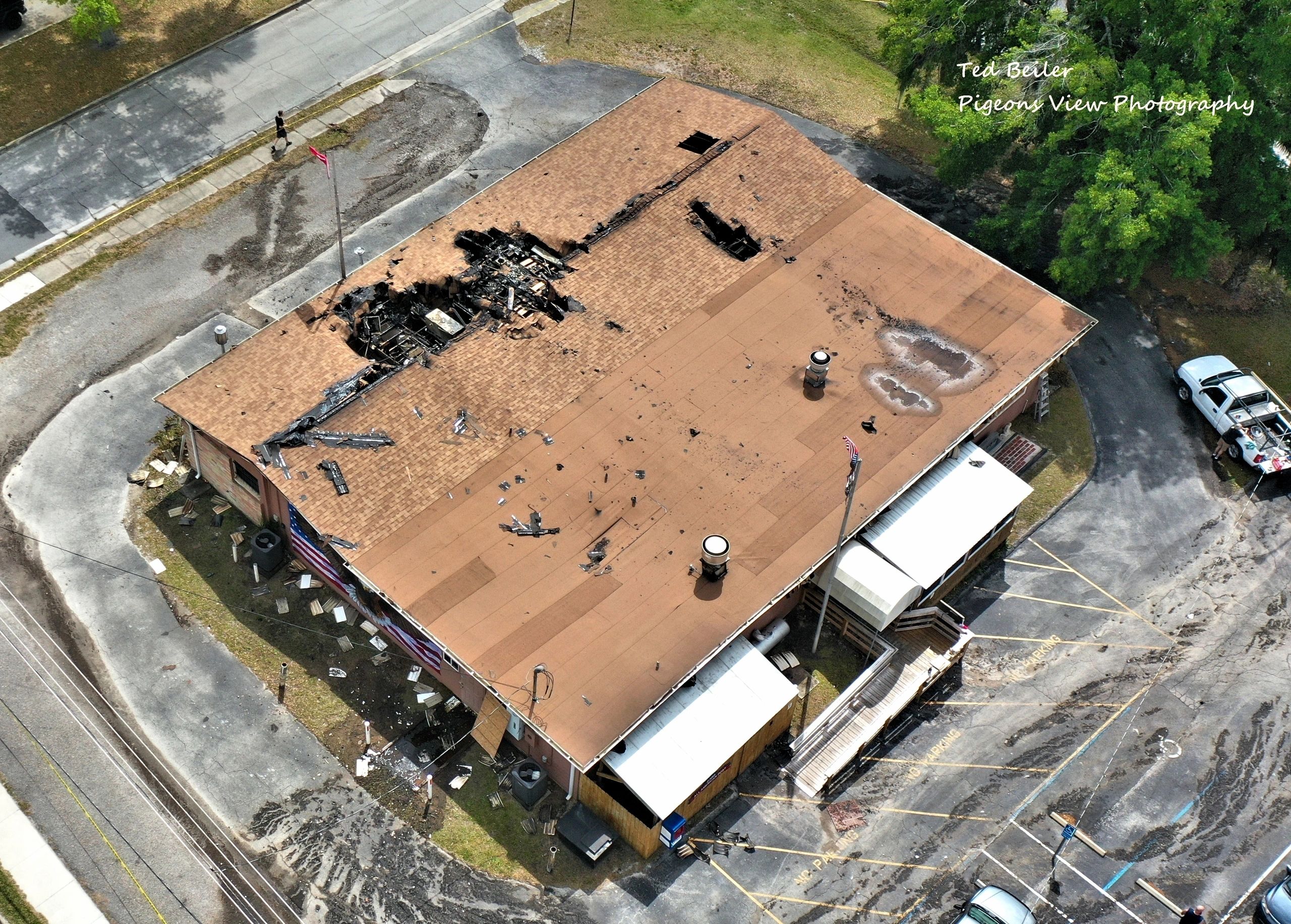 Fire aftermath on building roof