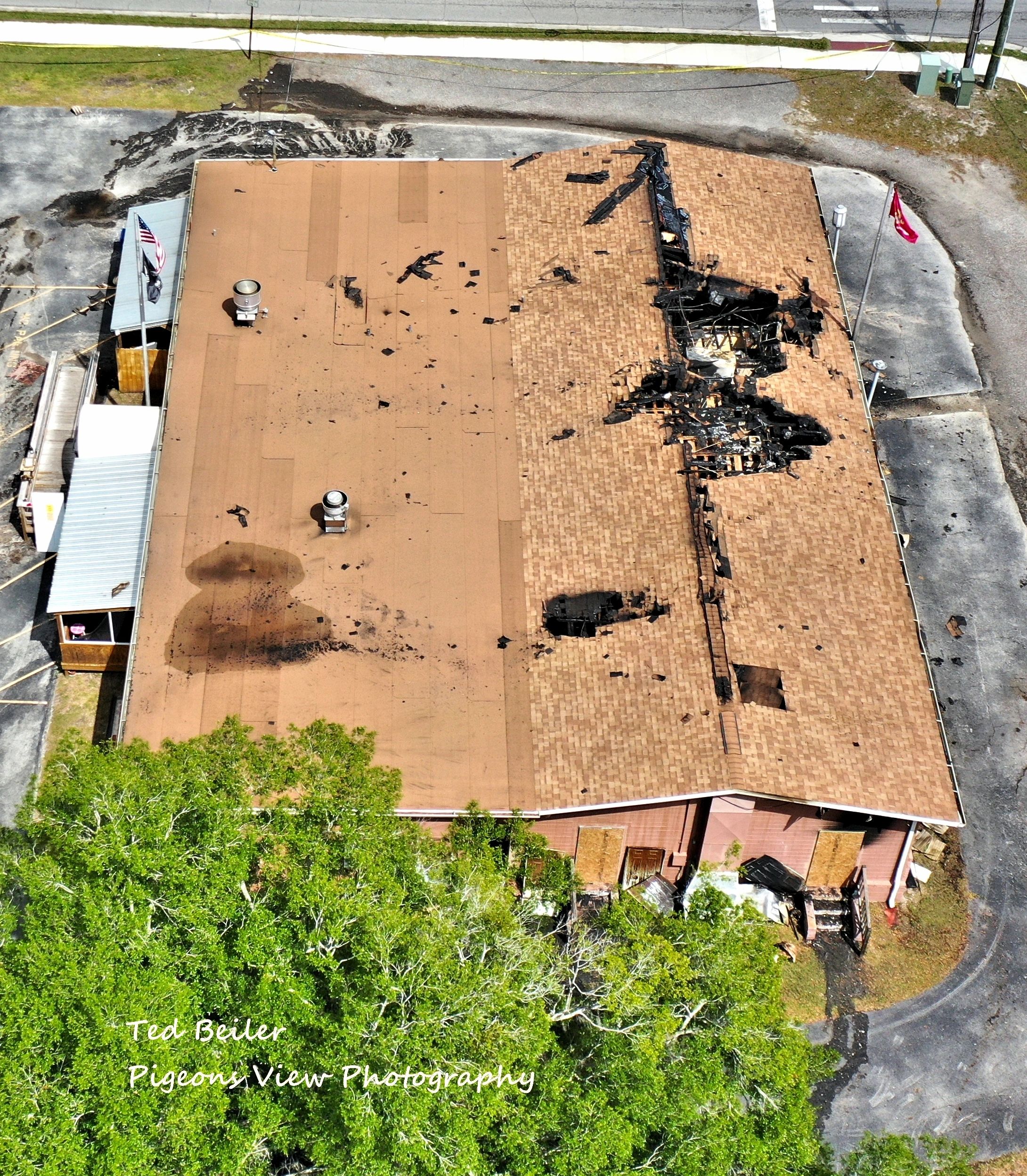 Building roof showing extensive fire damage