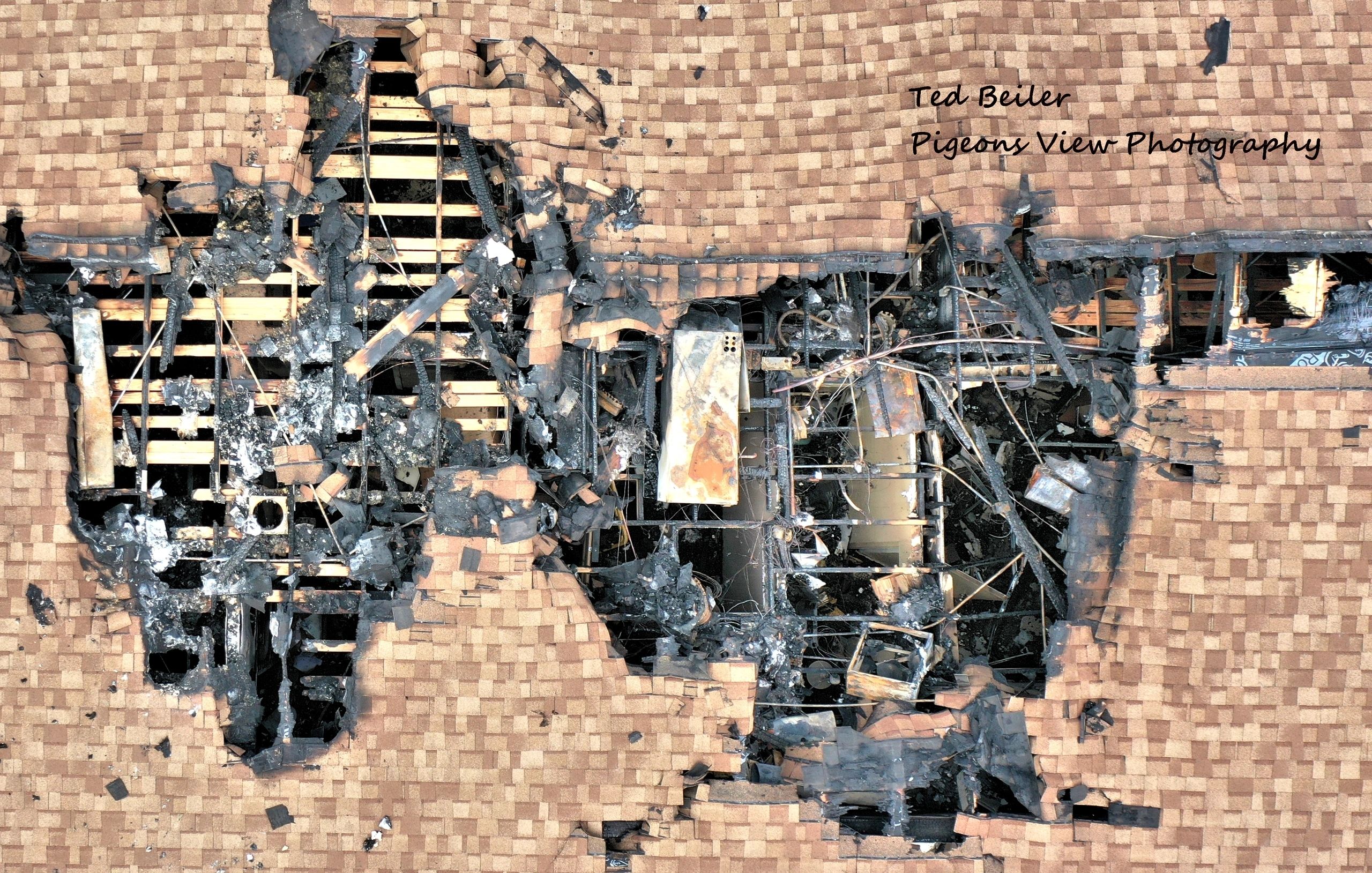 Burnt rooftop with extensive damage