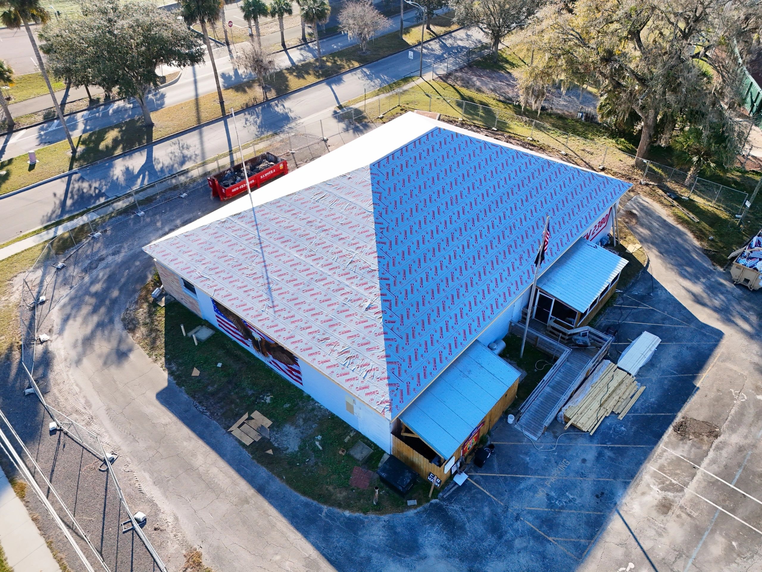 Construction site with completed roof