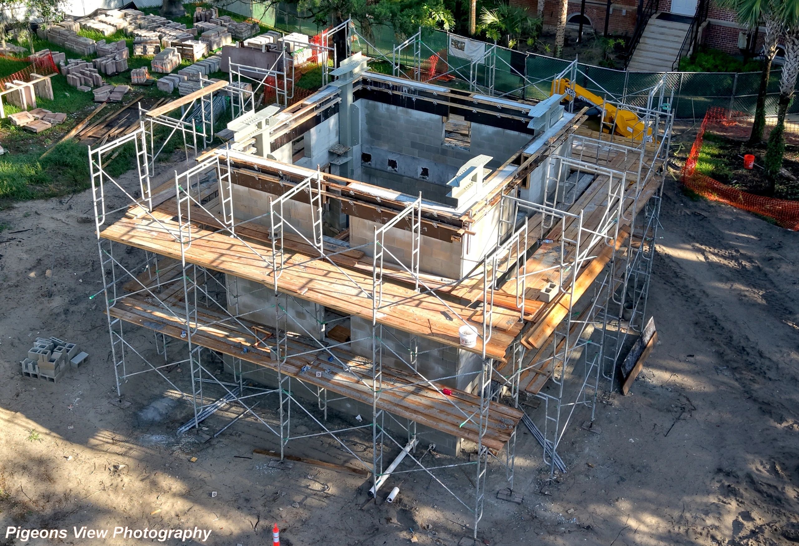 Building under construction with scaffolding