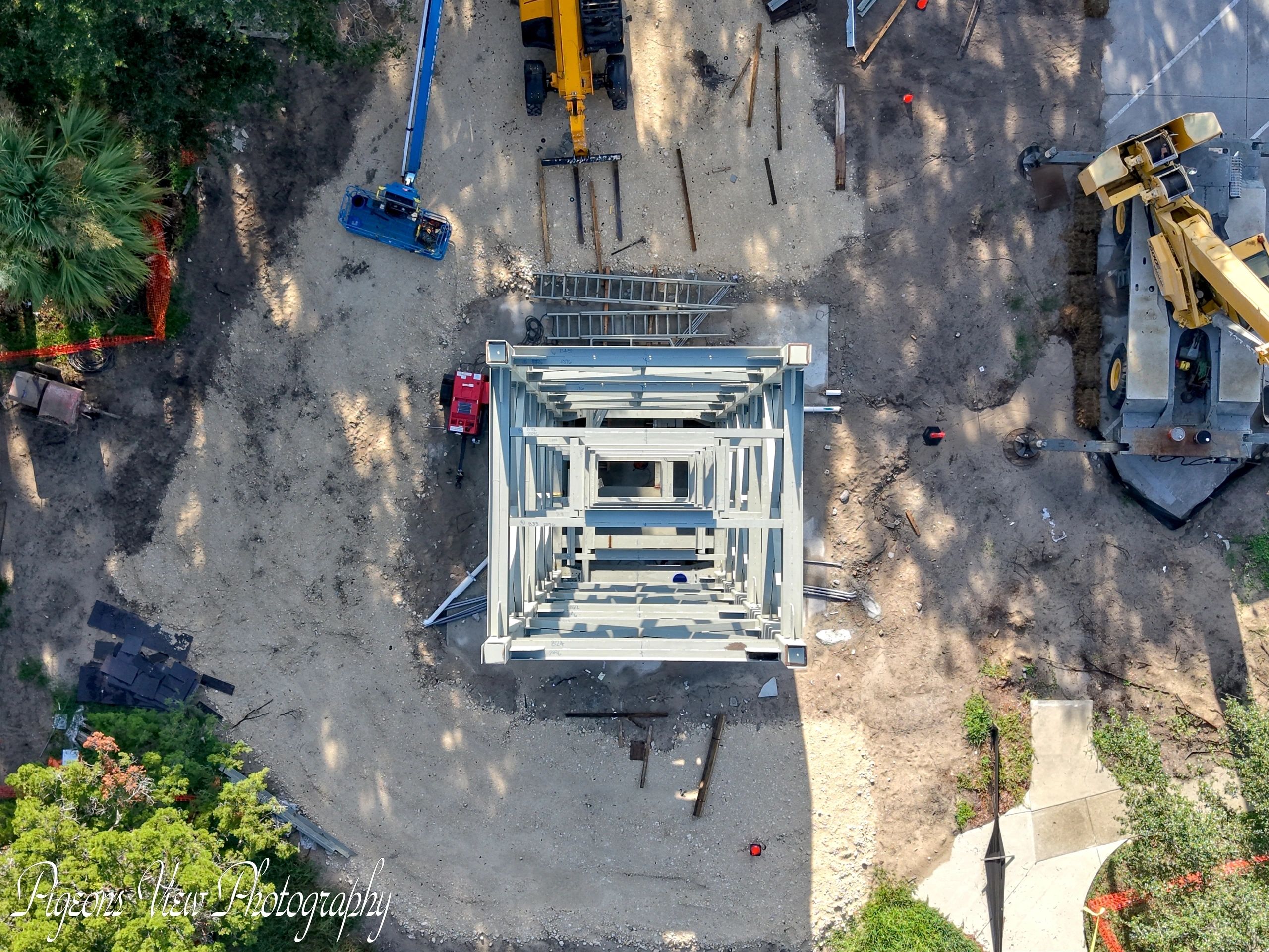 Aerial view of construction equipment and framework.