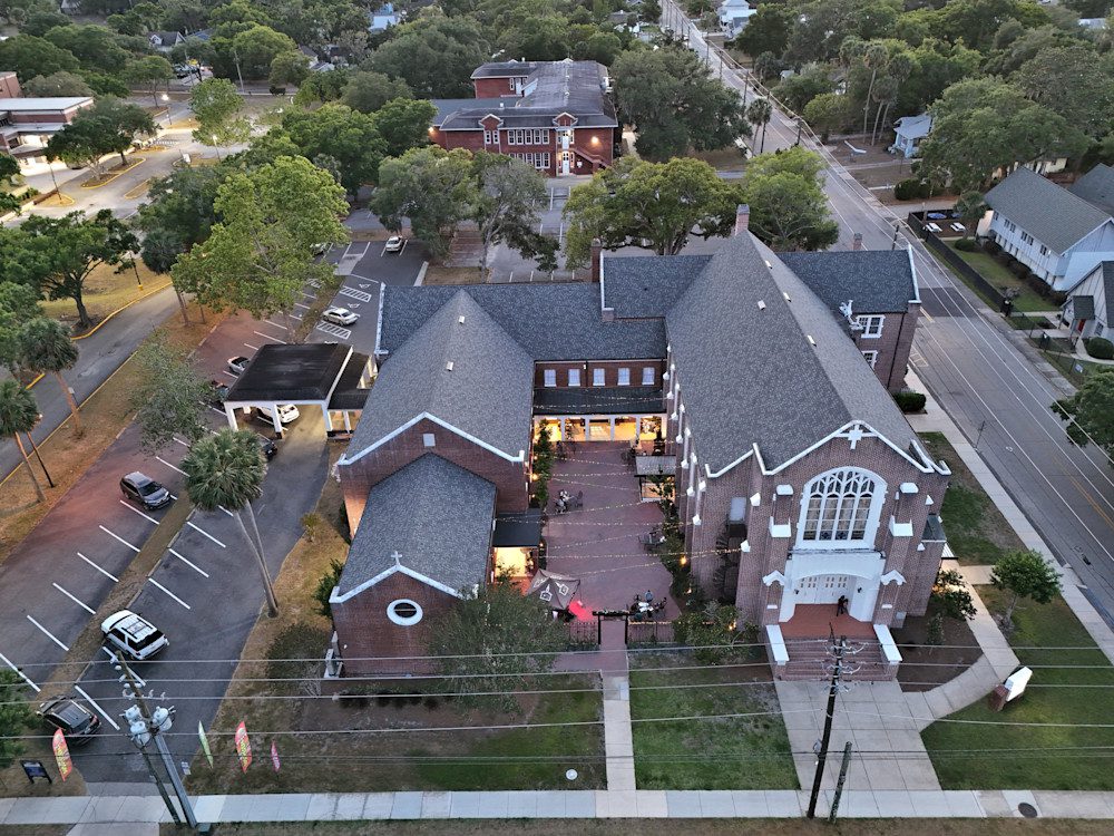 Aerial view of brick building complex