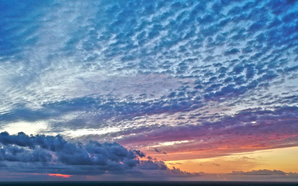 Colorful sunset sky with scattered clouds
