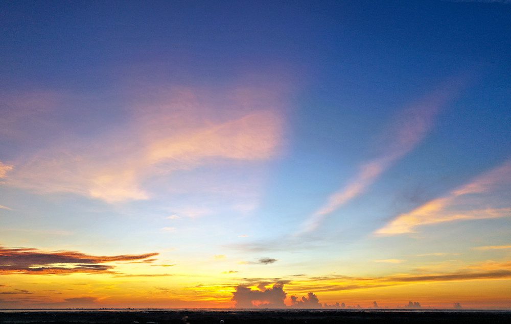 Dawn with bright, colorful sky hues