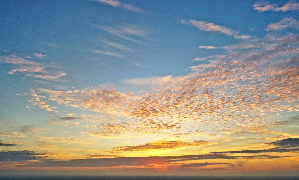 Evening sky painted with sunset hues