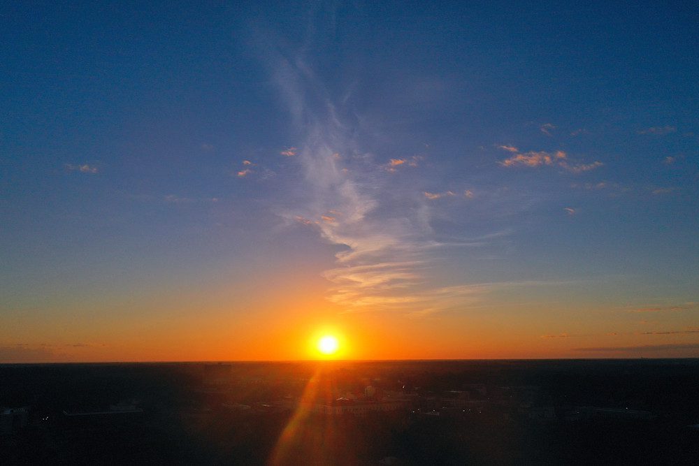 Sunset over horizon with colorful sky