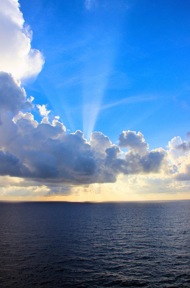 Bright sky with sunlit clouds