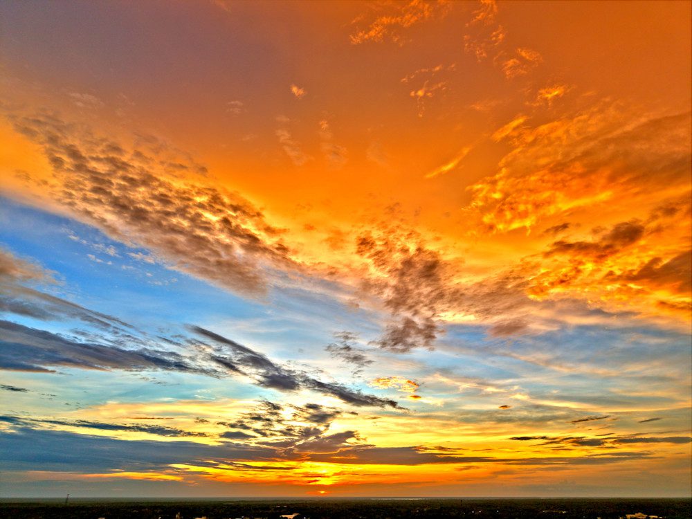 Vibrant sunset with orange and blue sky