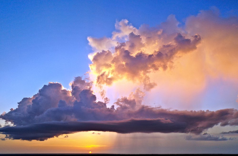 Sunset sky with illuminated clouds