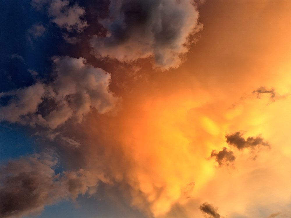 Fiery sunset clouds in the evening sky.