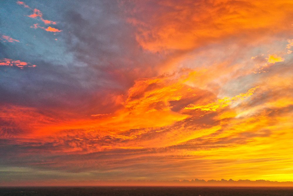 Vibrant sunset with orange and blue sky