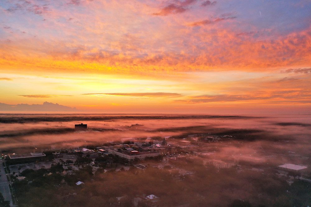 Morning mist covering urban landscape