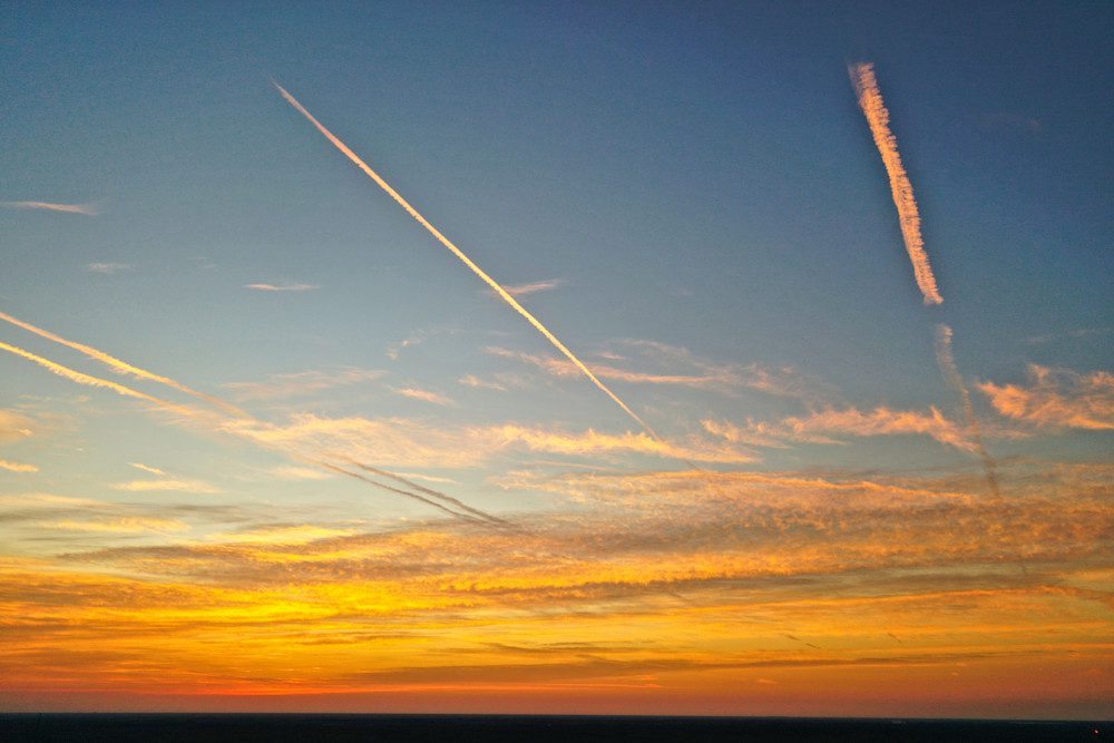 Vibrant sunset with streaked clouds