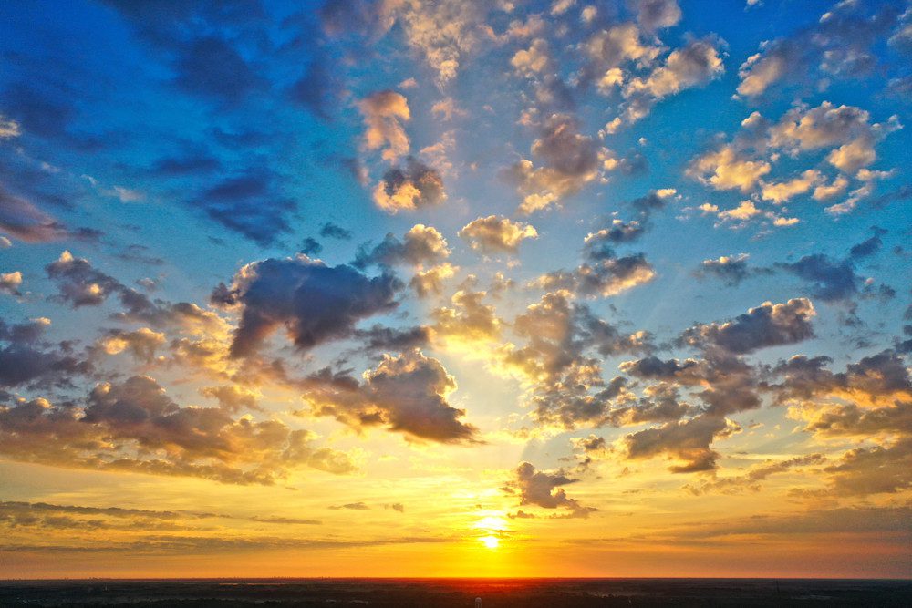 Colorful sunset with scattered clouds