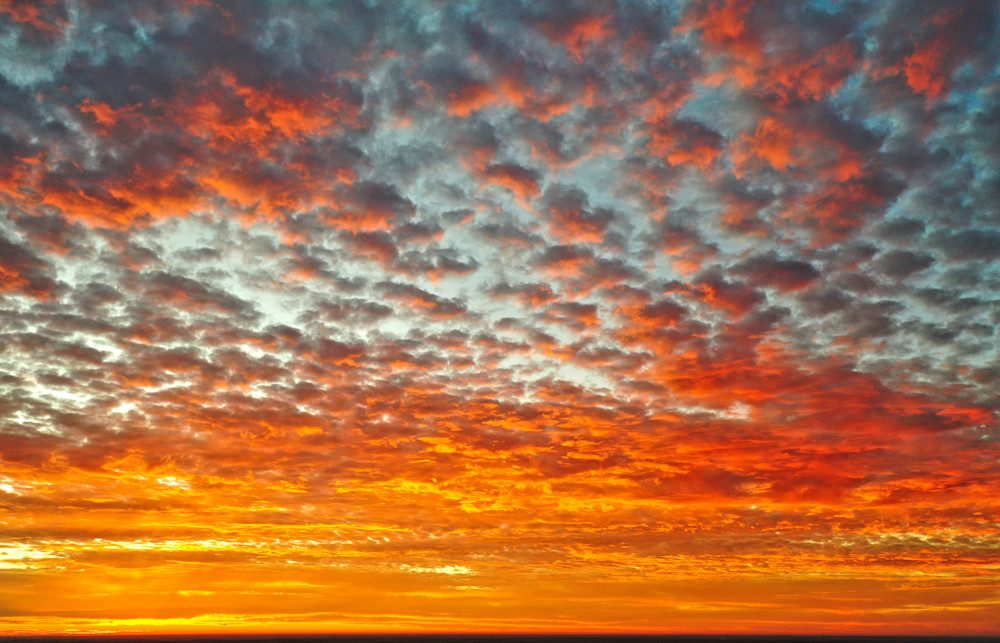 Dramatic orange and red sky at sunset