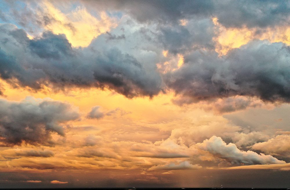 Dramatic sunset with dark clouds