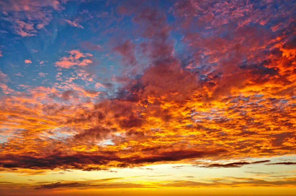 Dramatic orange and purple sunset clouds
