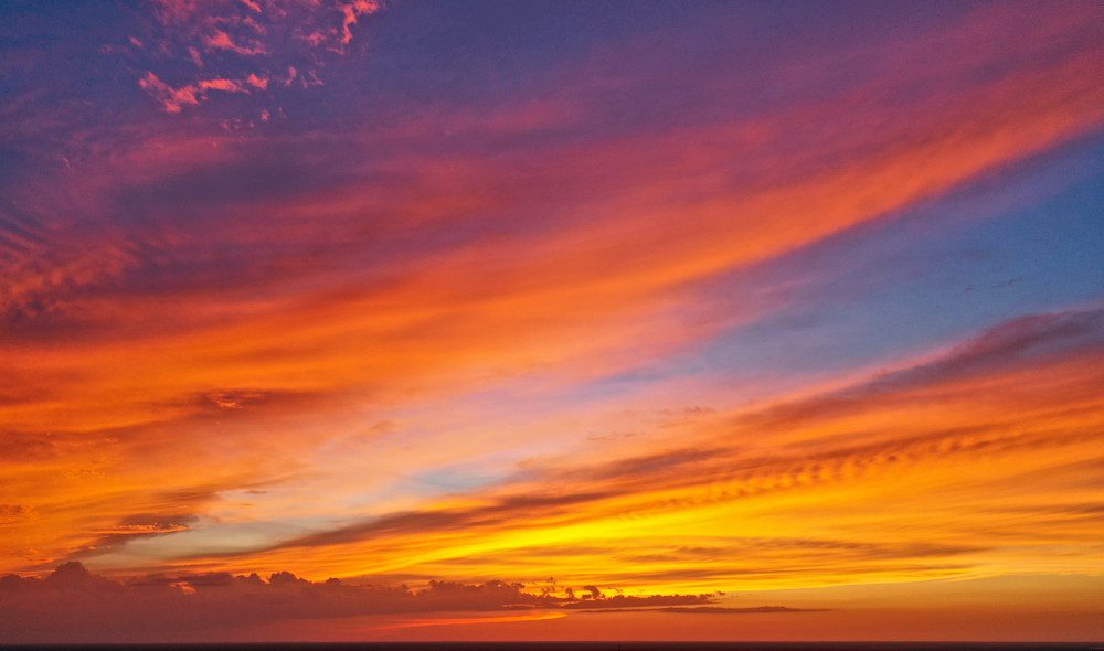 Colorful evening sky with vivid orange hues.