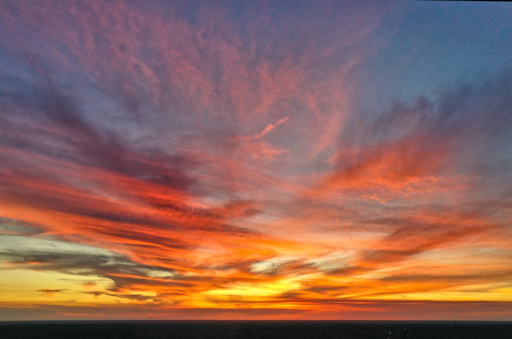 Fiery sunset over horizon