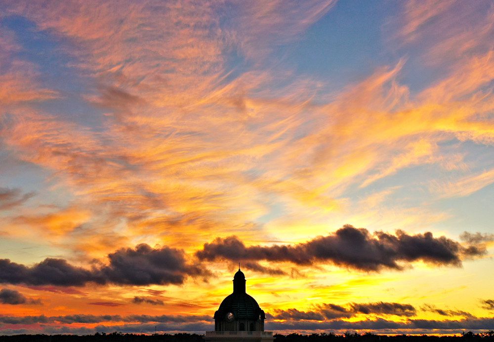 Silhouette of dome against sunset sky