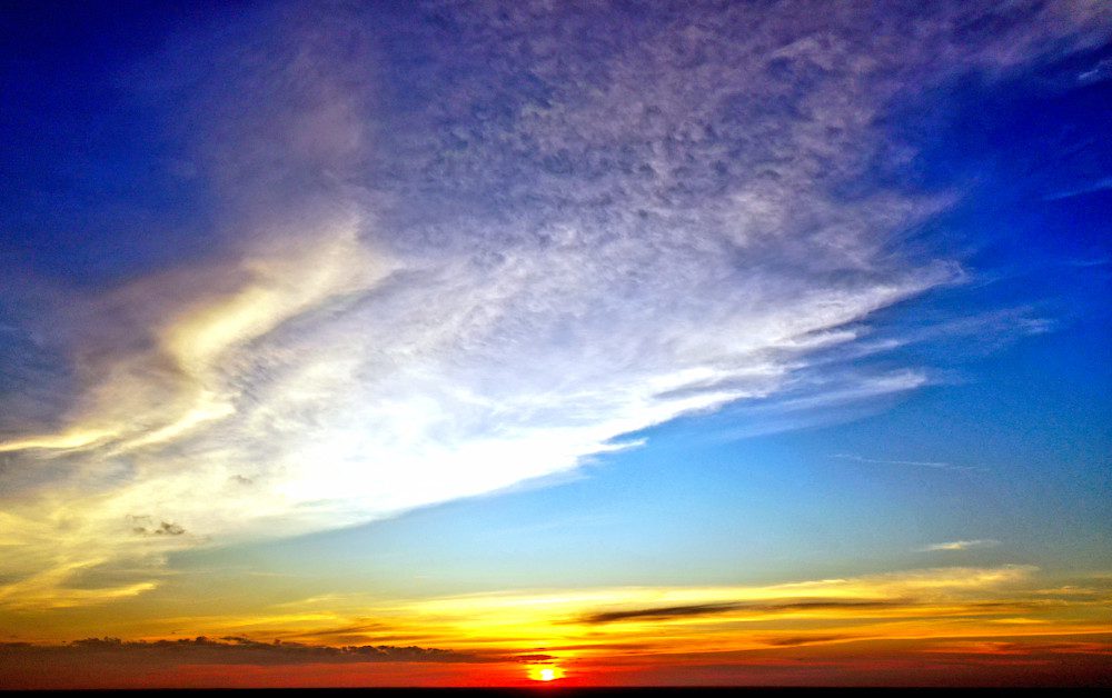 Vibrant sunset sky over horizon