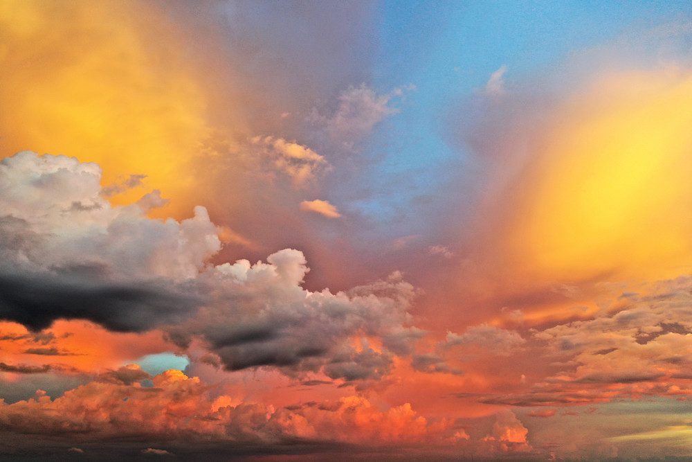 Colorful sunset sky with dramatic clouds.