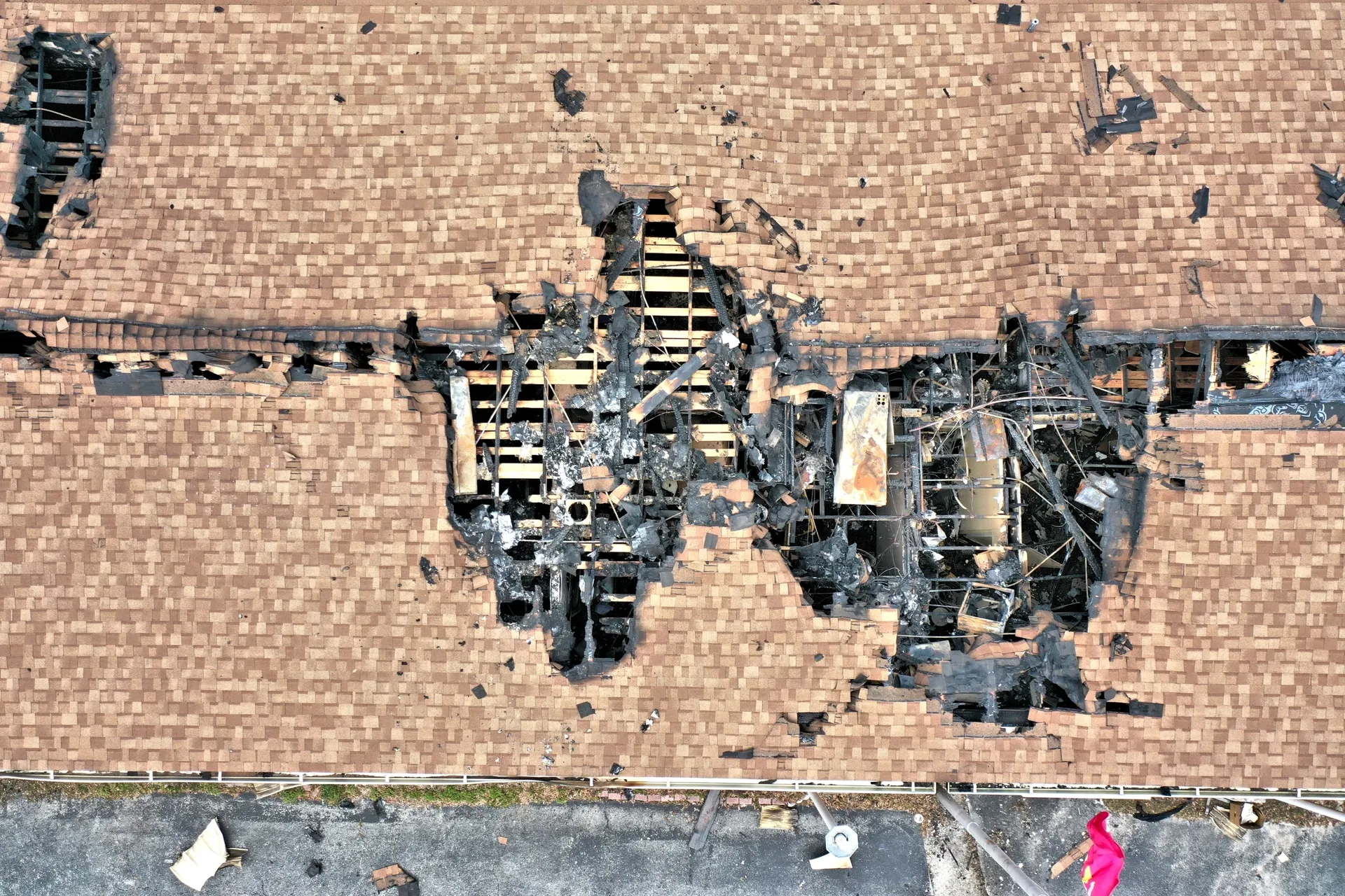 Damaged roof with large holes