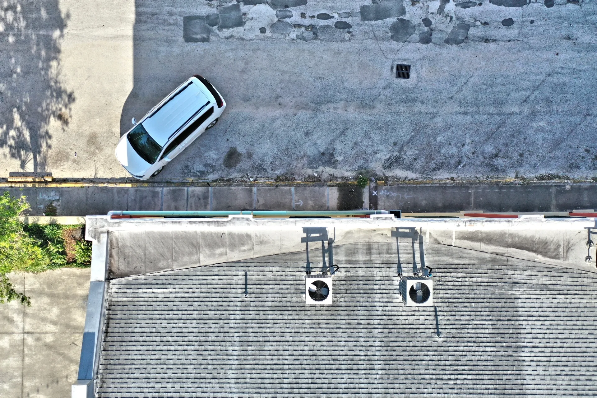 Car parked near building rooftop
