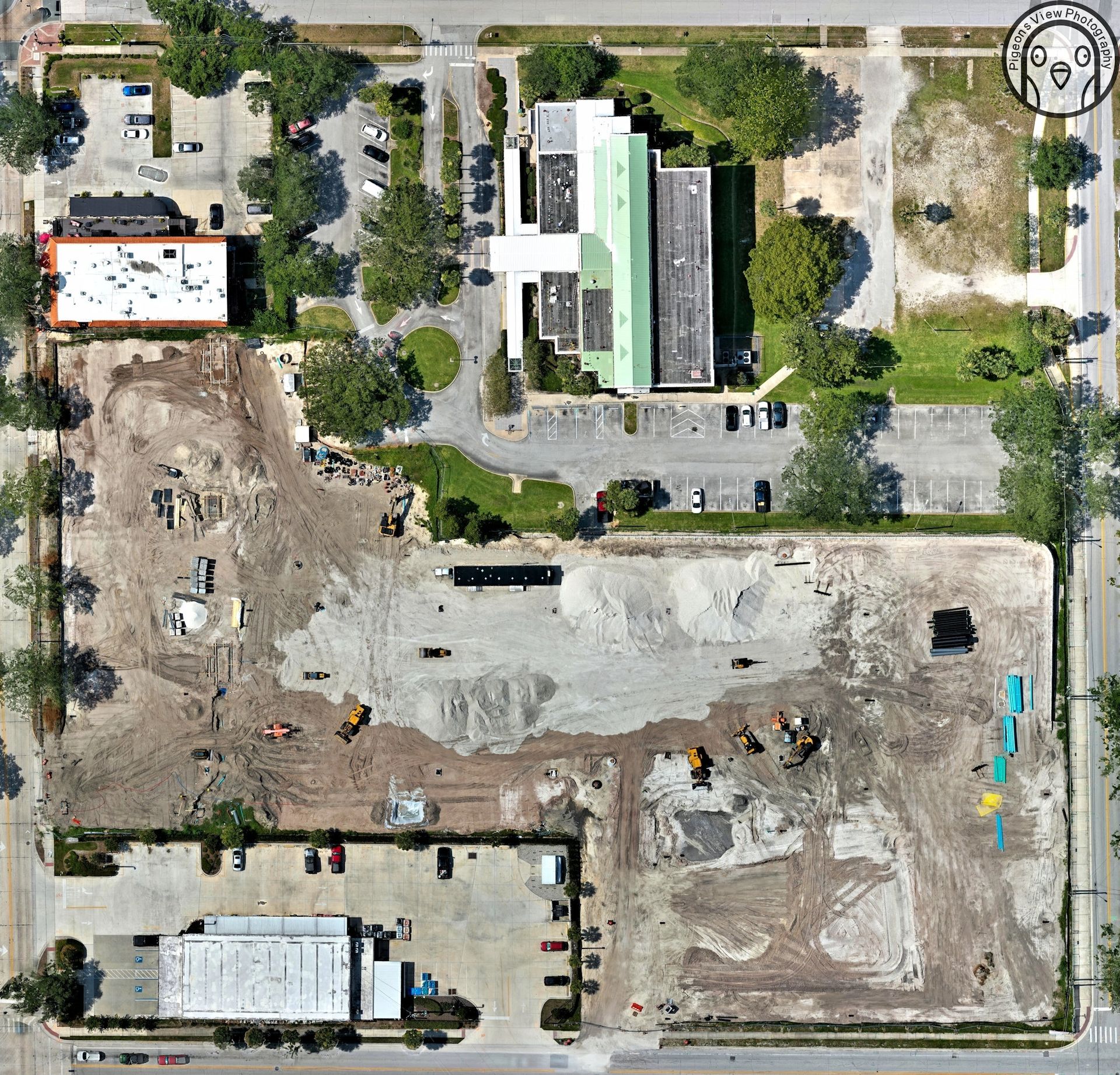 Building site with vehicles and materials