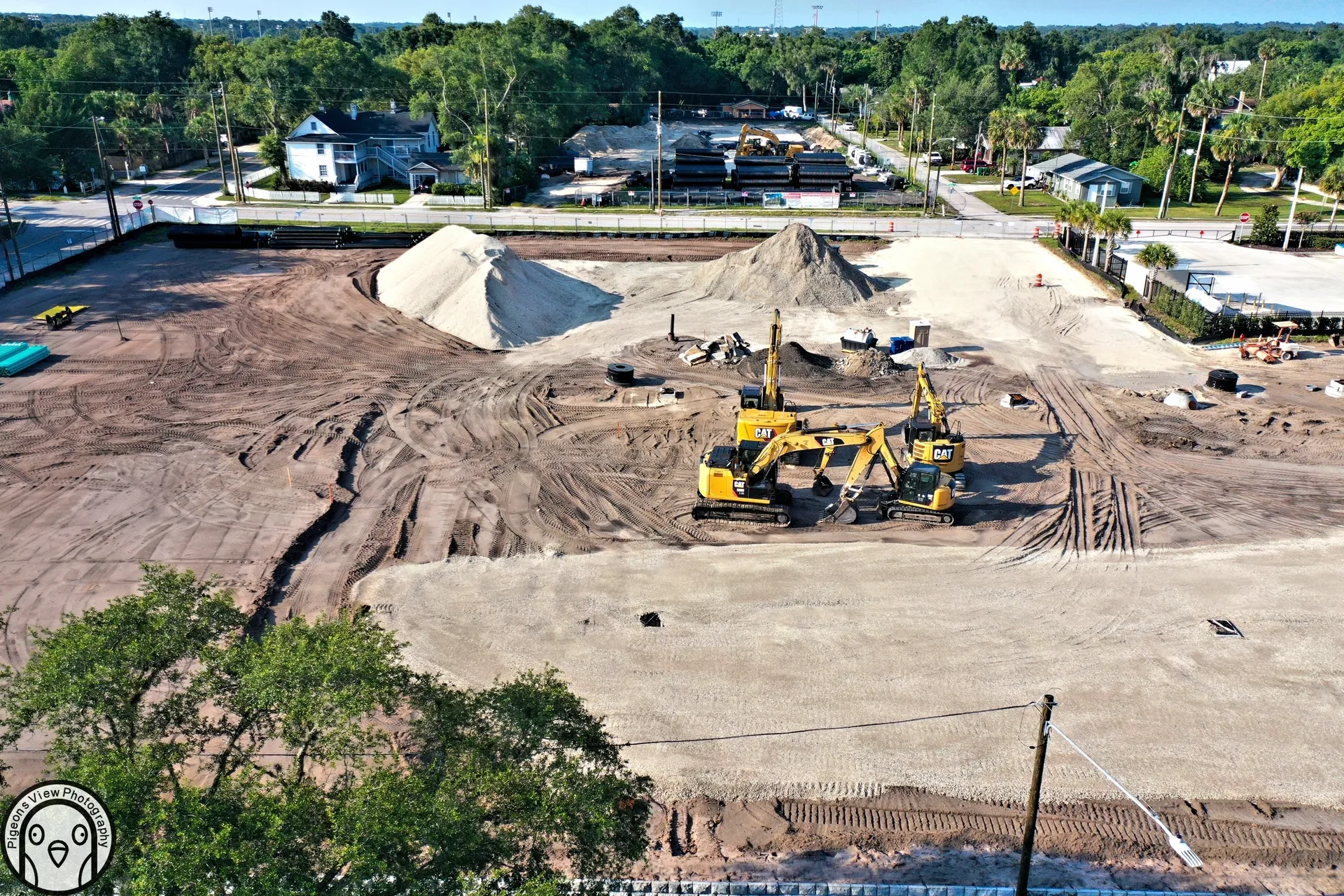 Aerial view of construction equipment and materials.