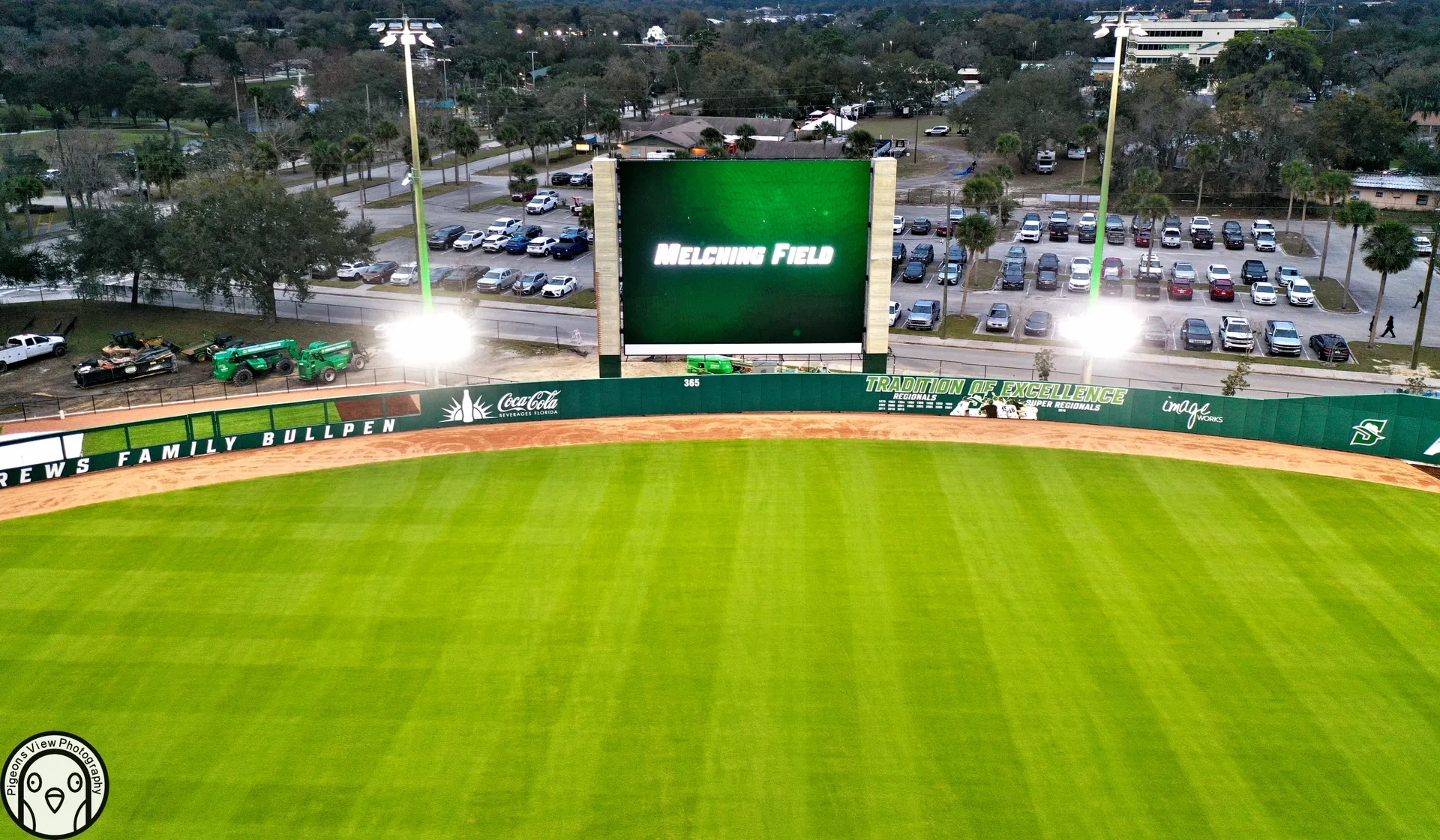 Baseball field with large scoreboard
