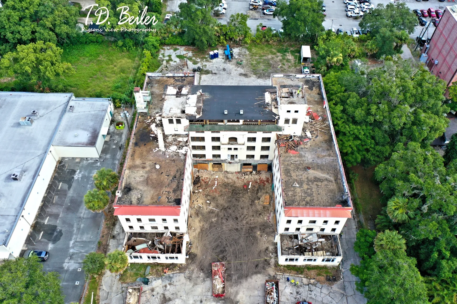 Construction site surrounded by trees