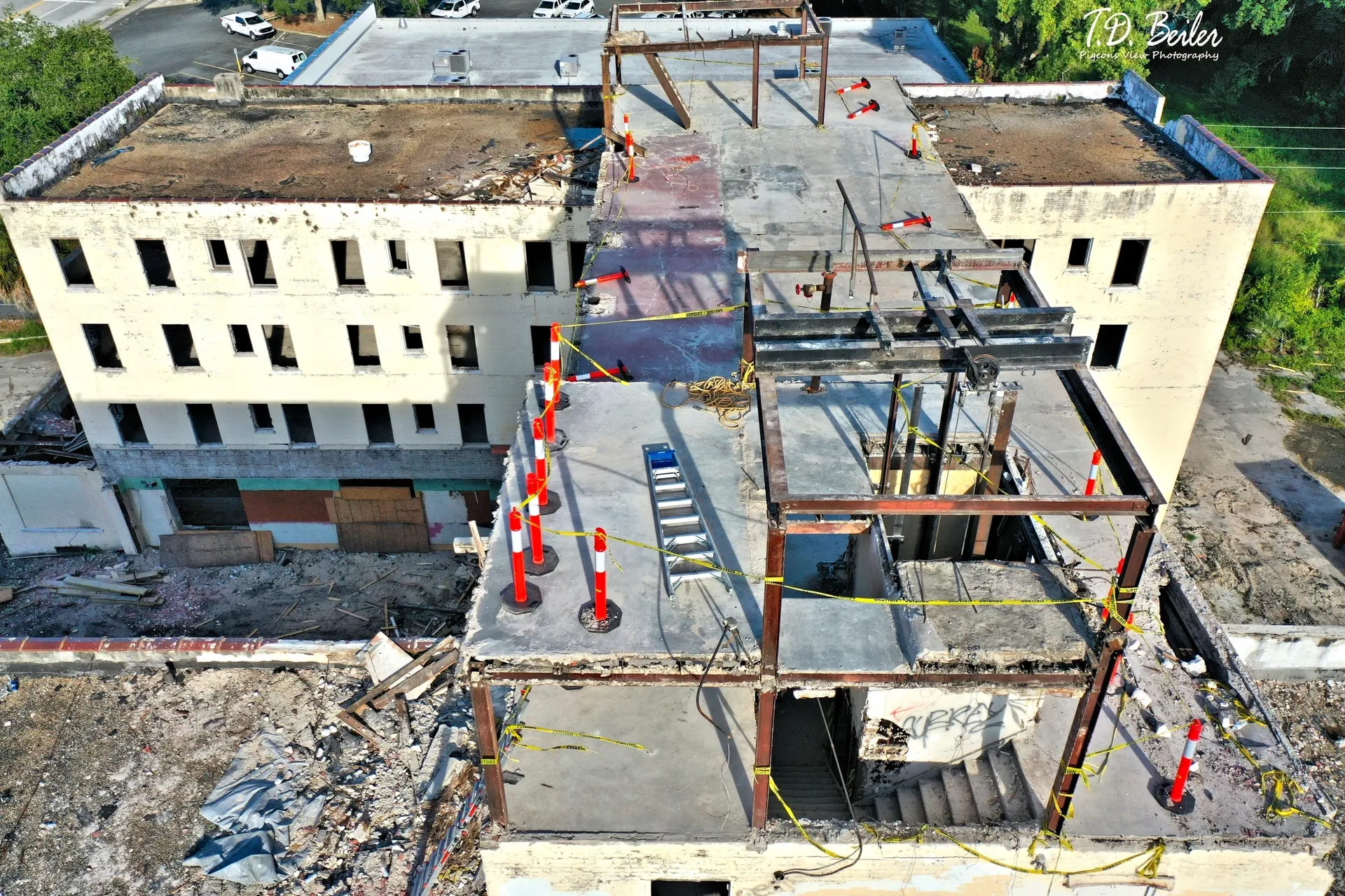 Aerial view of building demolition progress