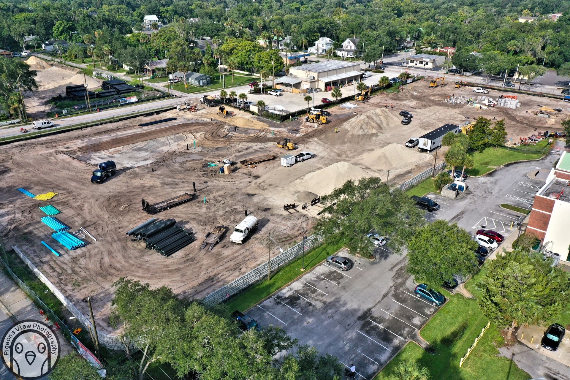 Construction site with vehicles and materials