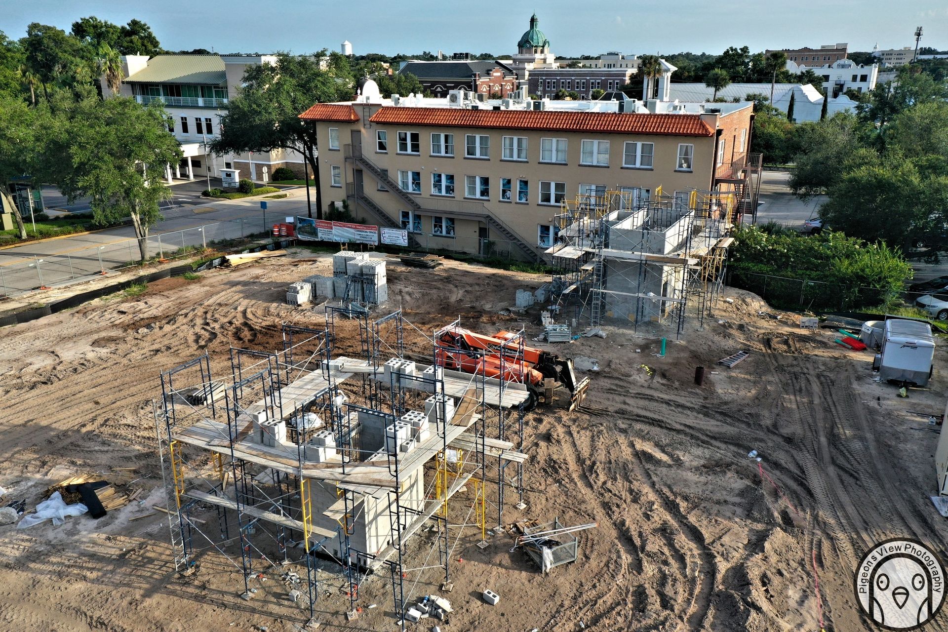 Urban construction scene with heavy equipment
