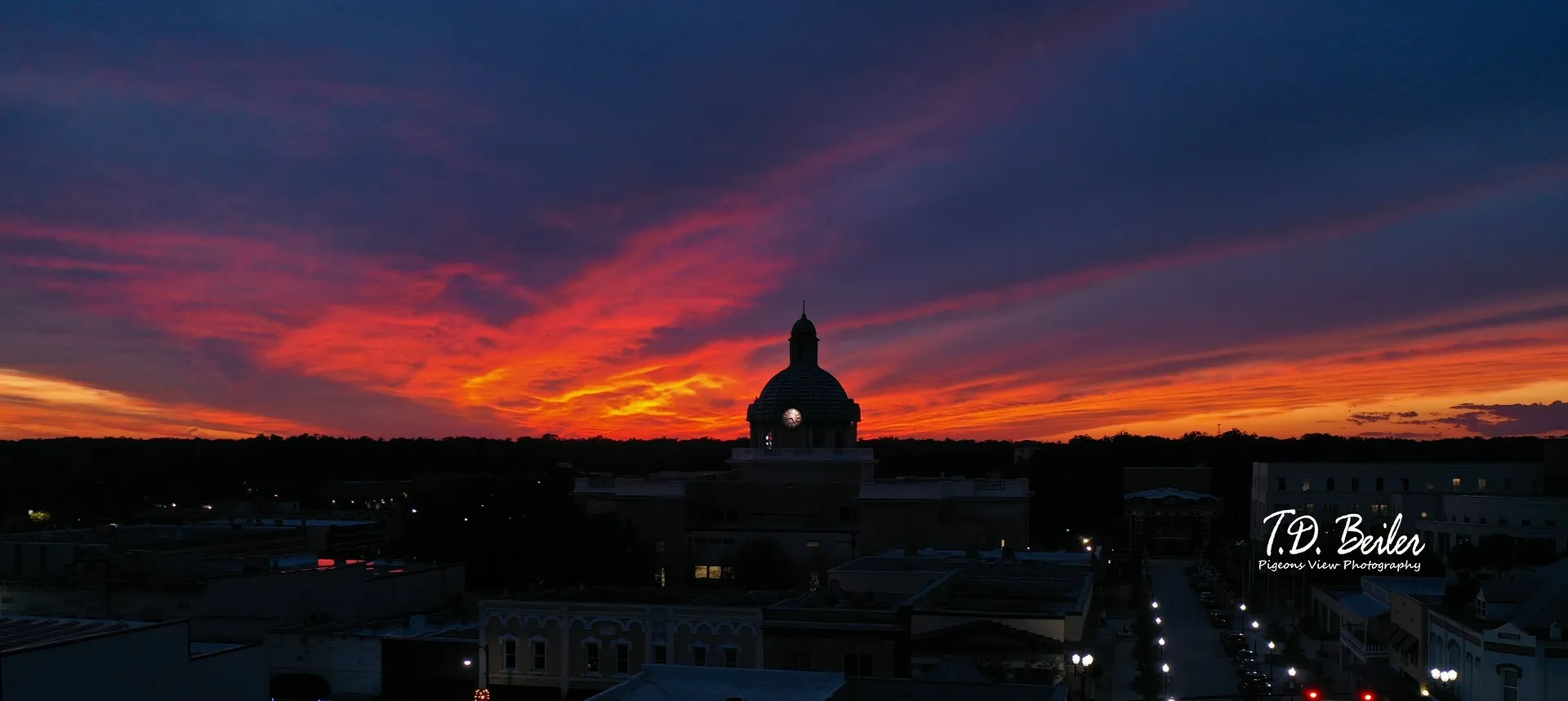 Fiery sunset illuminating downtown skyline