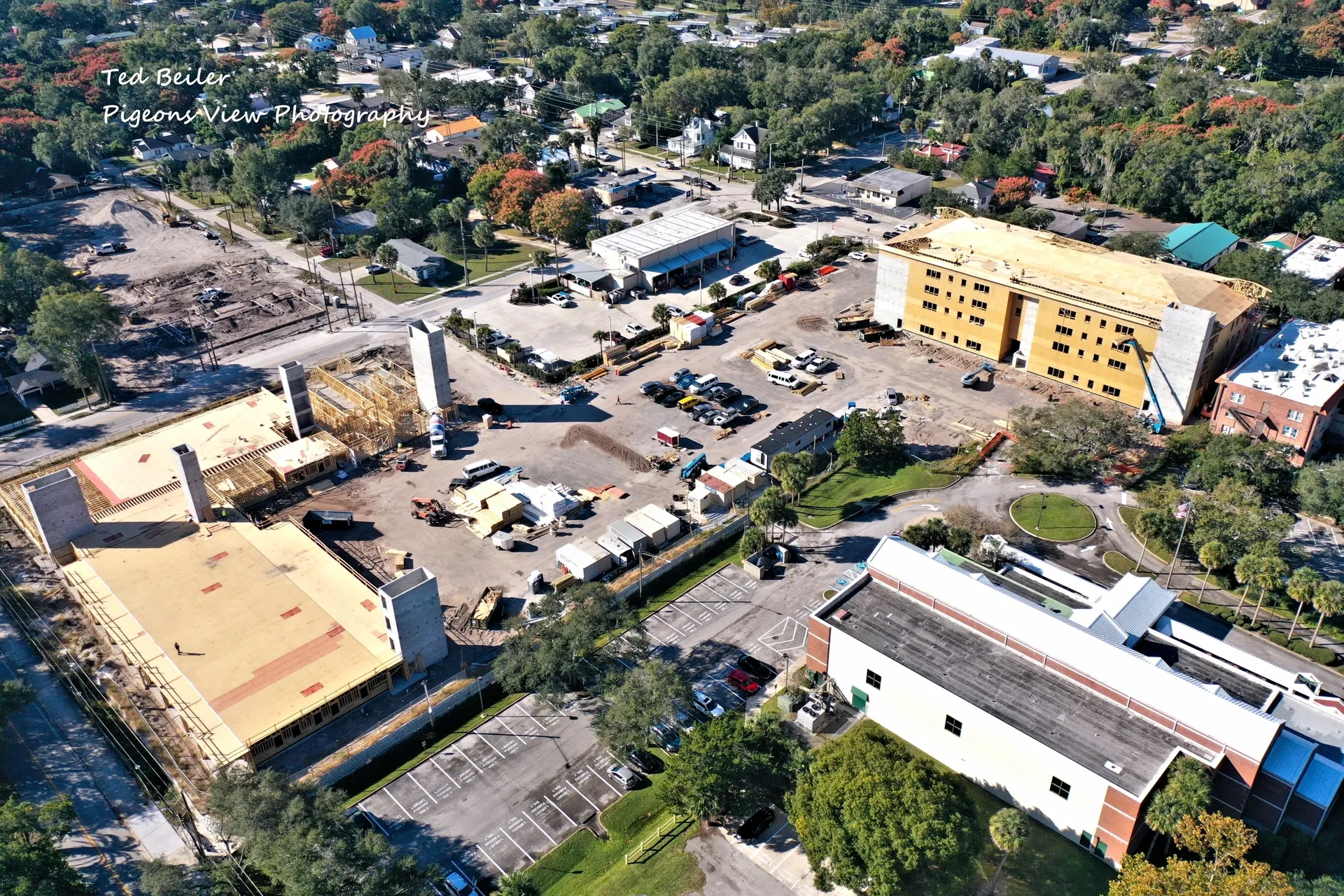 Cityscape with construction and greenery