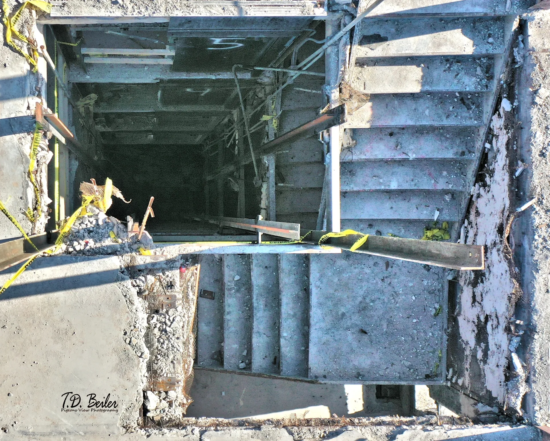 Concrete stairs descending into darkness
