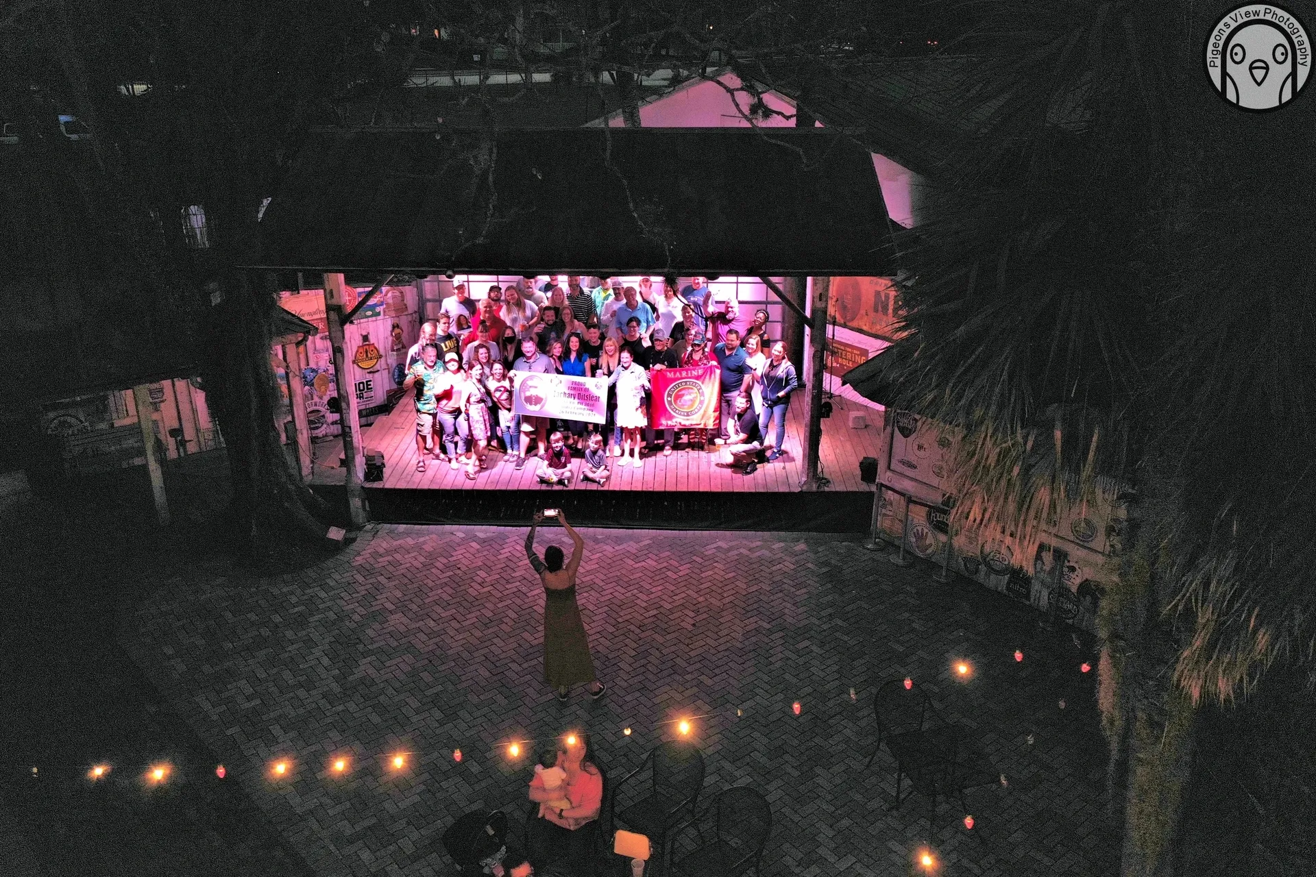 Nighttime group celebration on stage