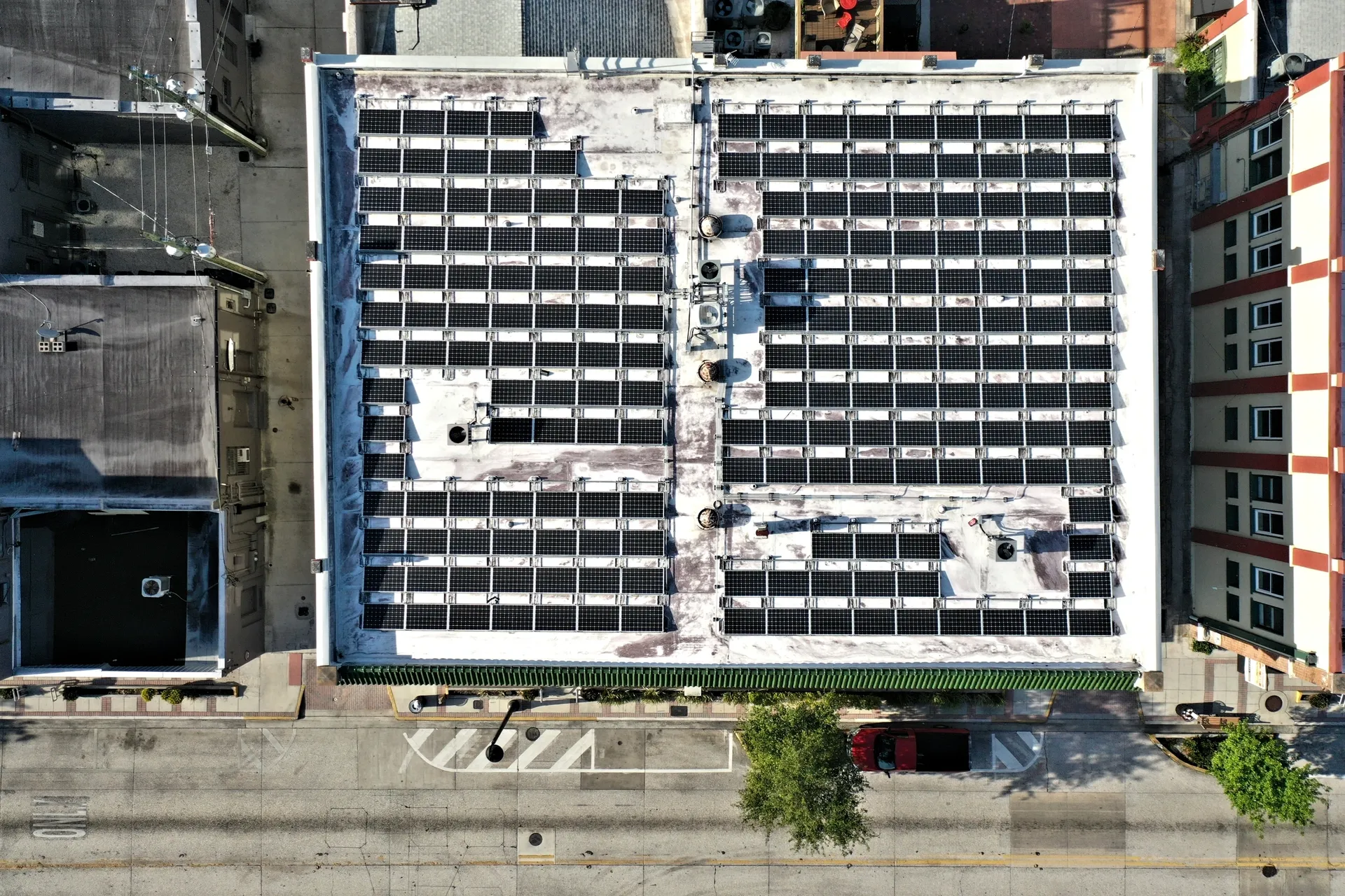Solar panels covering building rooftop