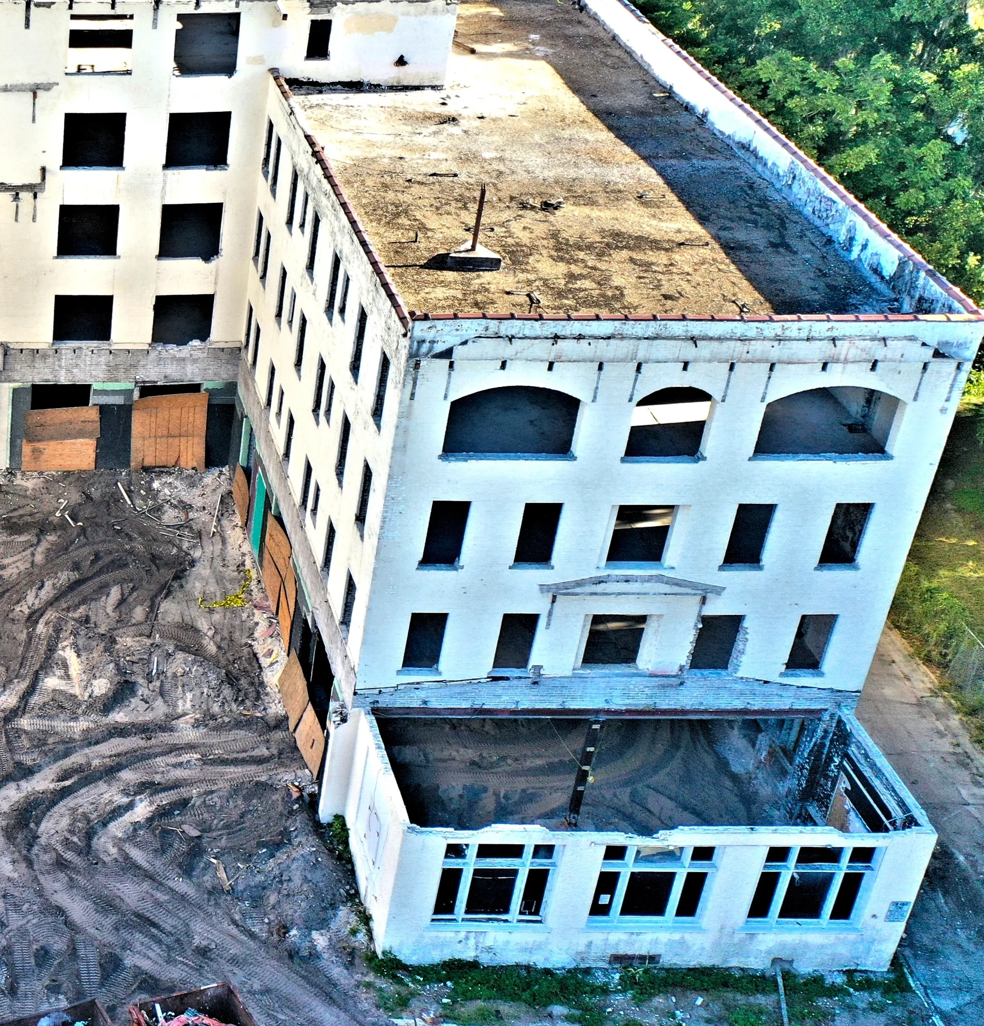 Abandoned building with boarded windows