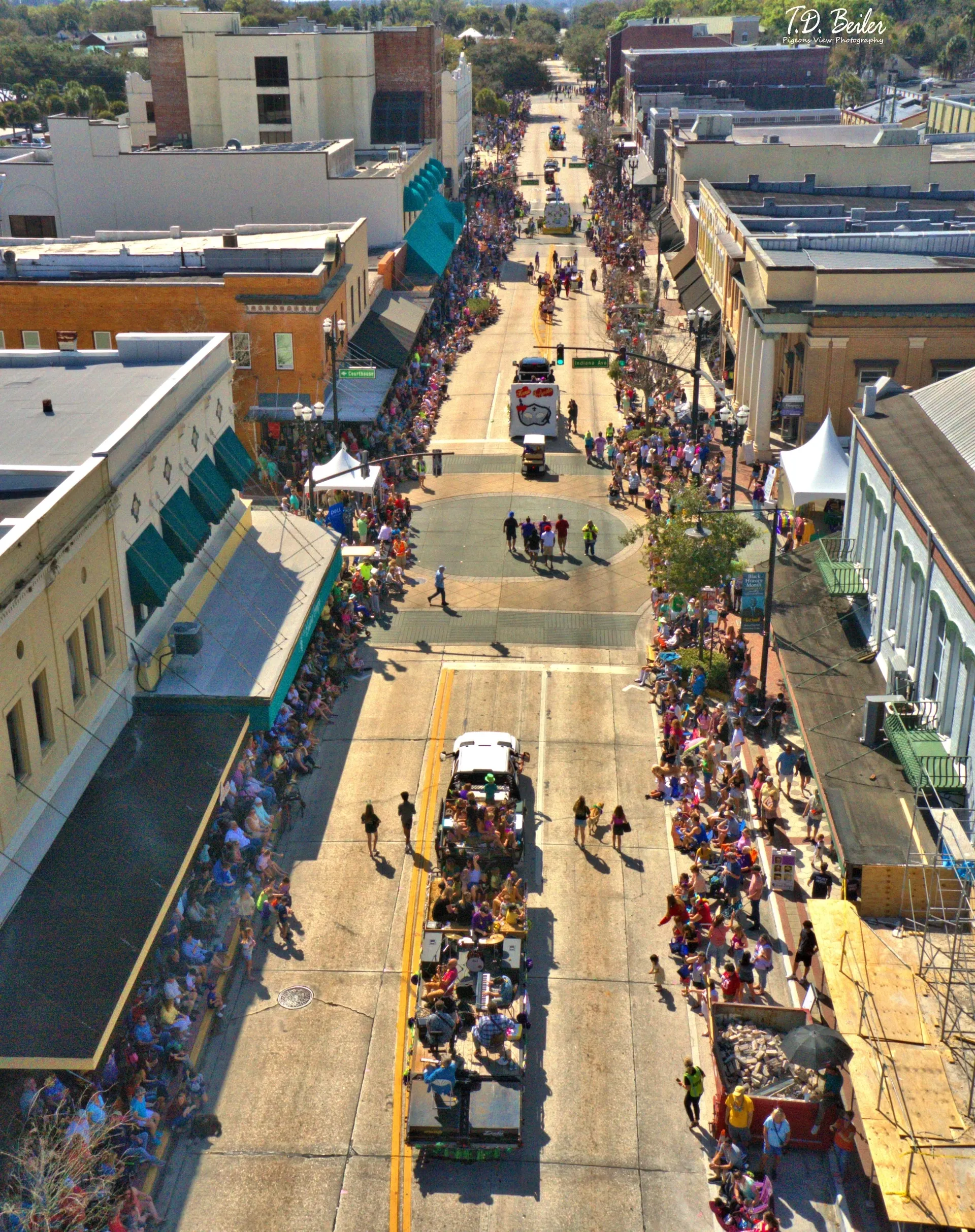 Aerial view of vibrant city parade