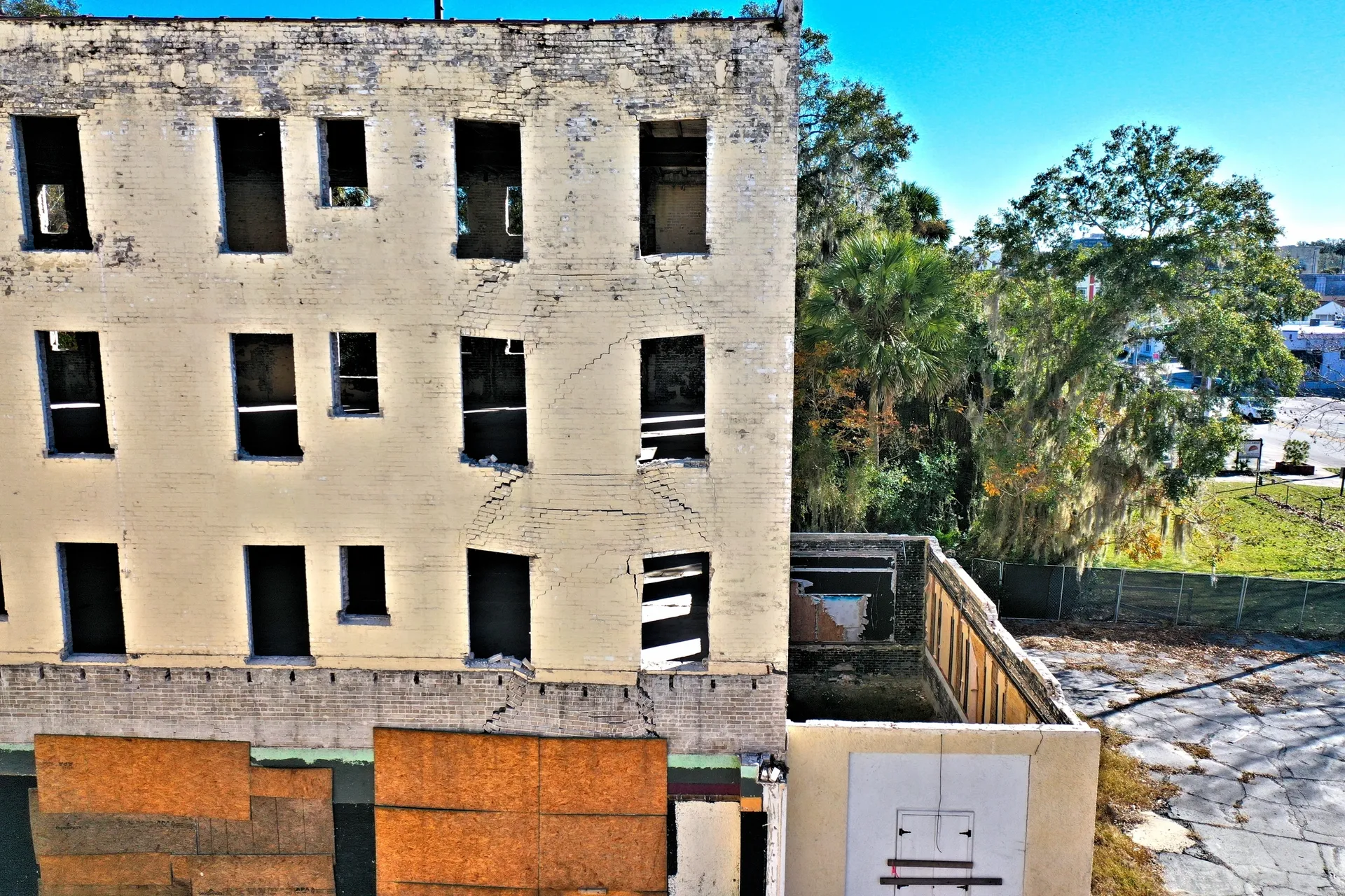 Abandoned building with boarded windows