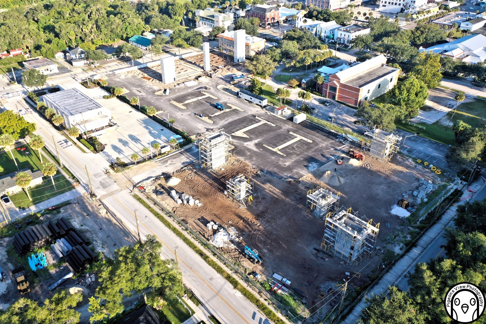 Building foundations and cranes at construction site
