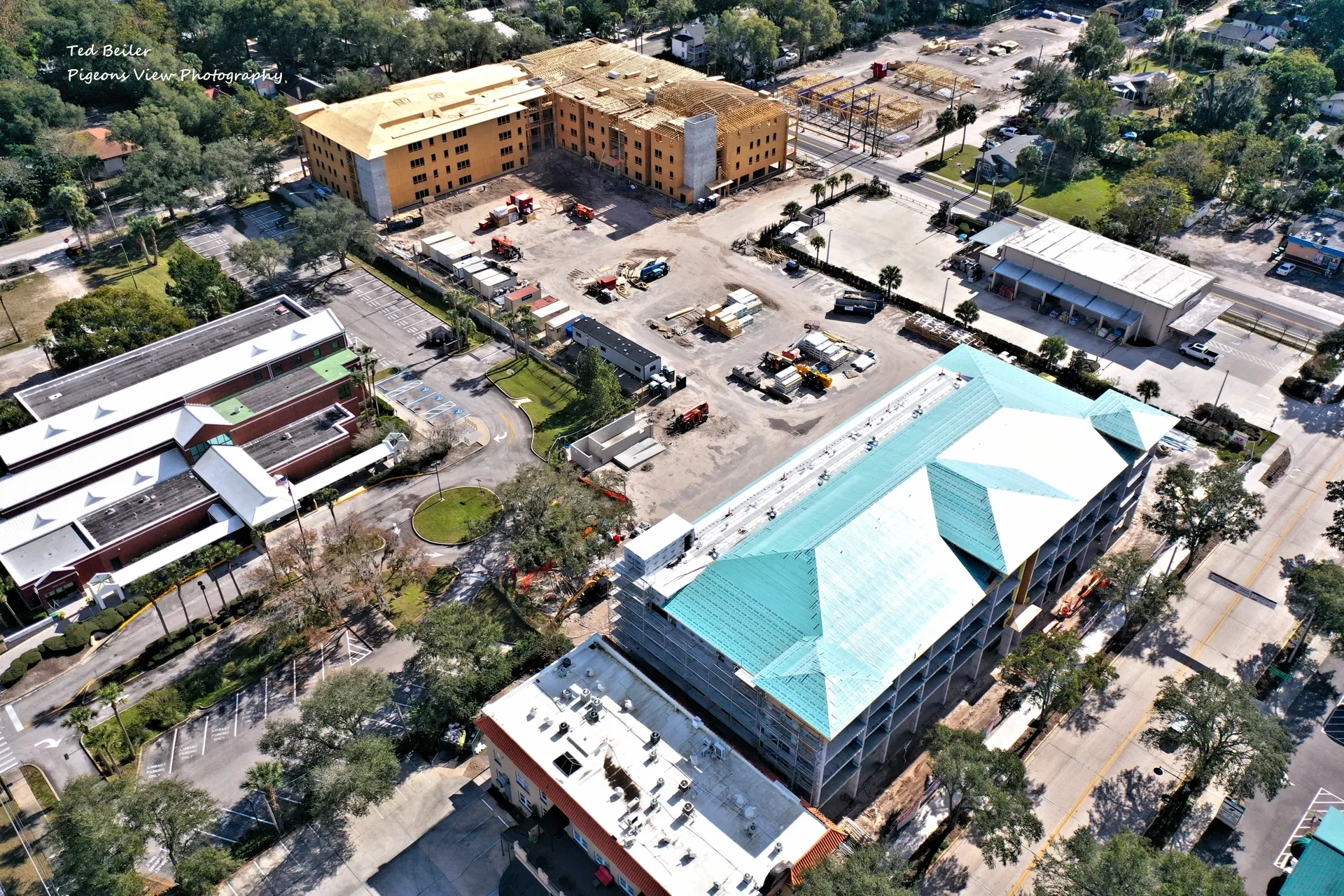 Urban development with surrounding trees.