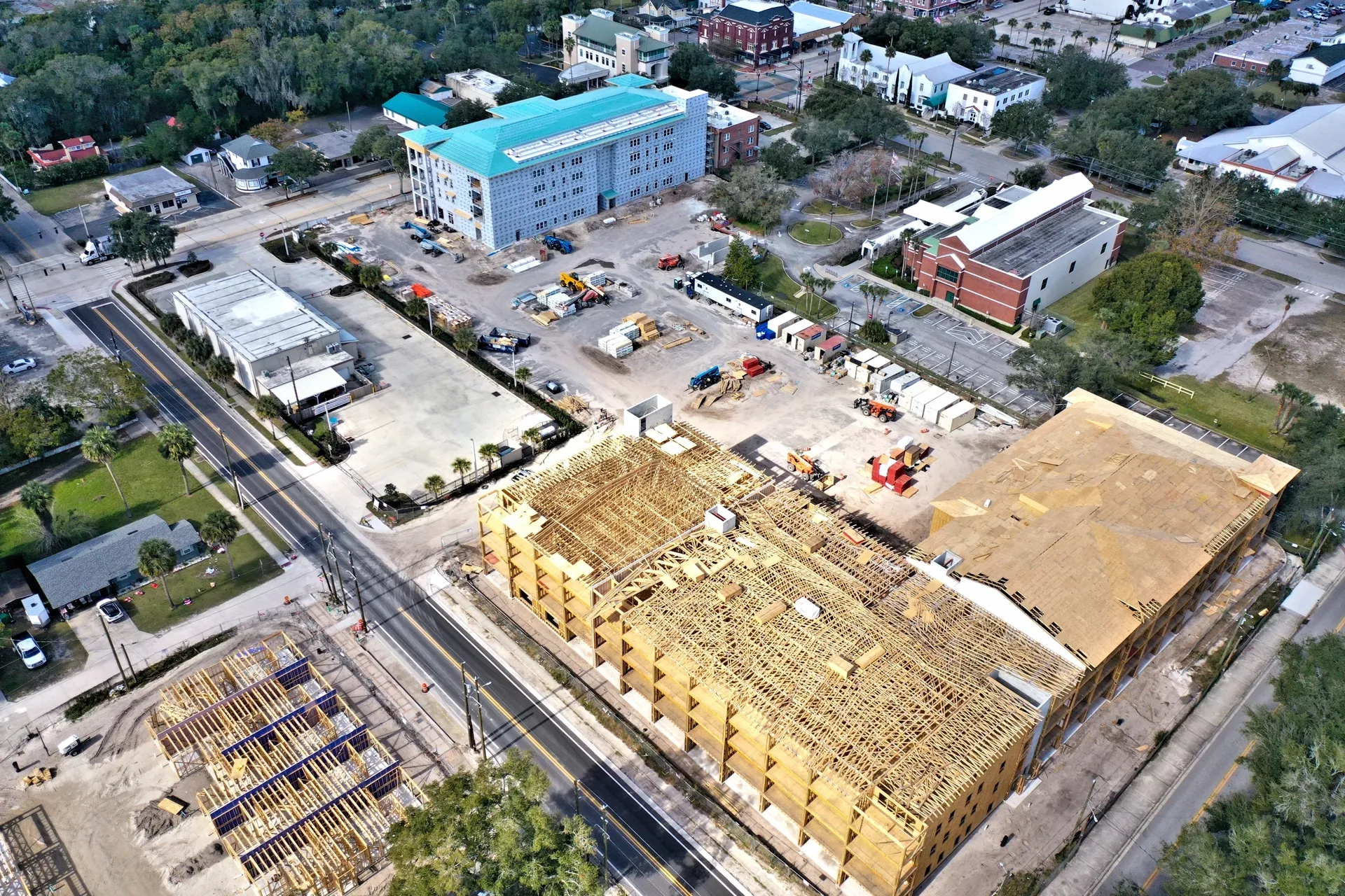 New building framework near city structures