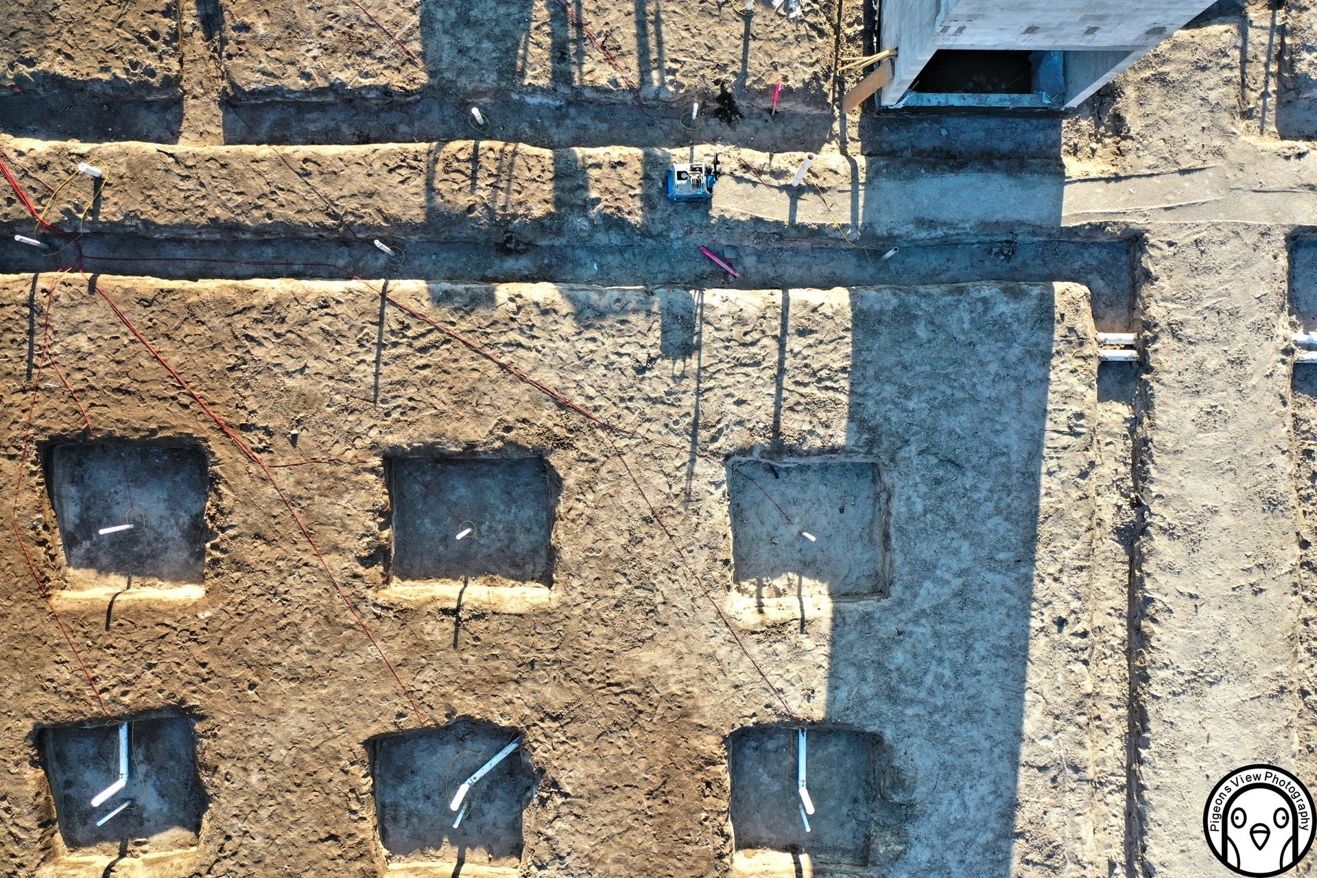 Construction site aerial view with foundations