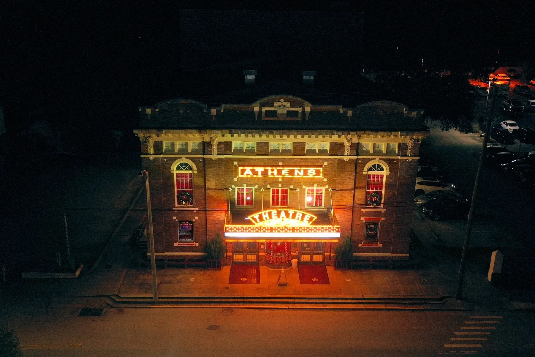 Historic theater illuminated at night
