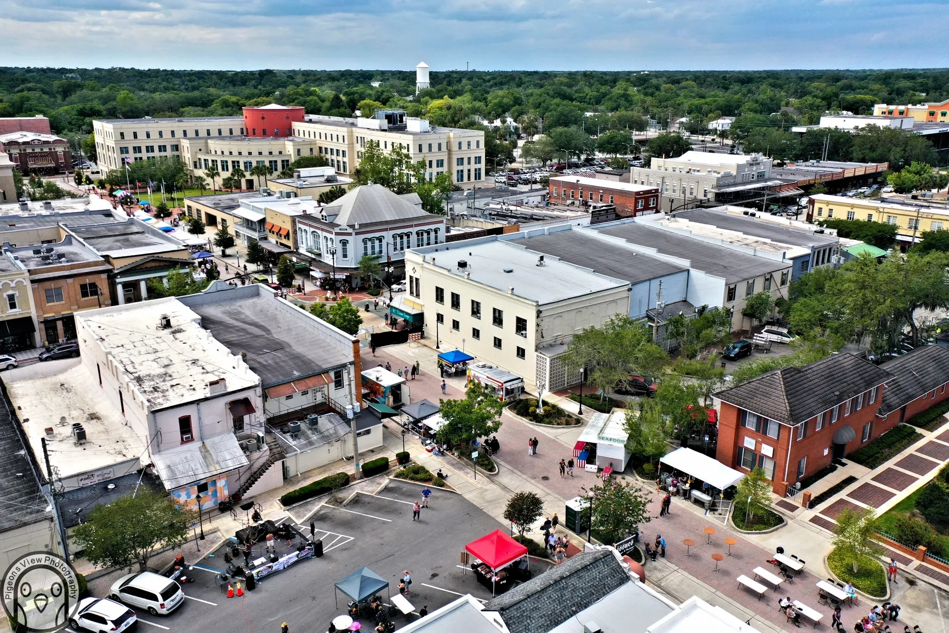 Vibrant town center with people and buildings.